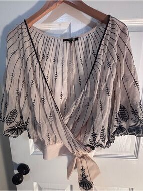 Cream colored Embroidered Wrap Top with Black Detailing